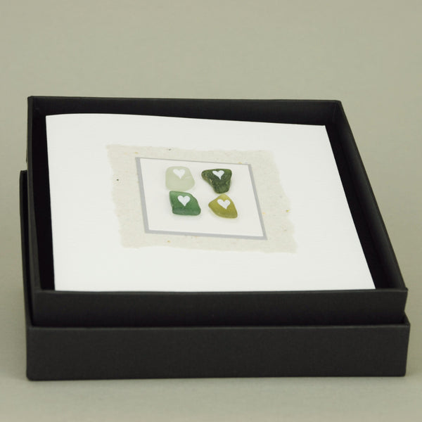 Hand-made greeting card with Scottish beach sea glass painted with simple white hearts