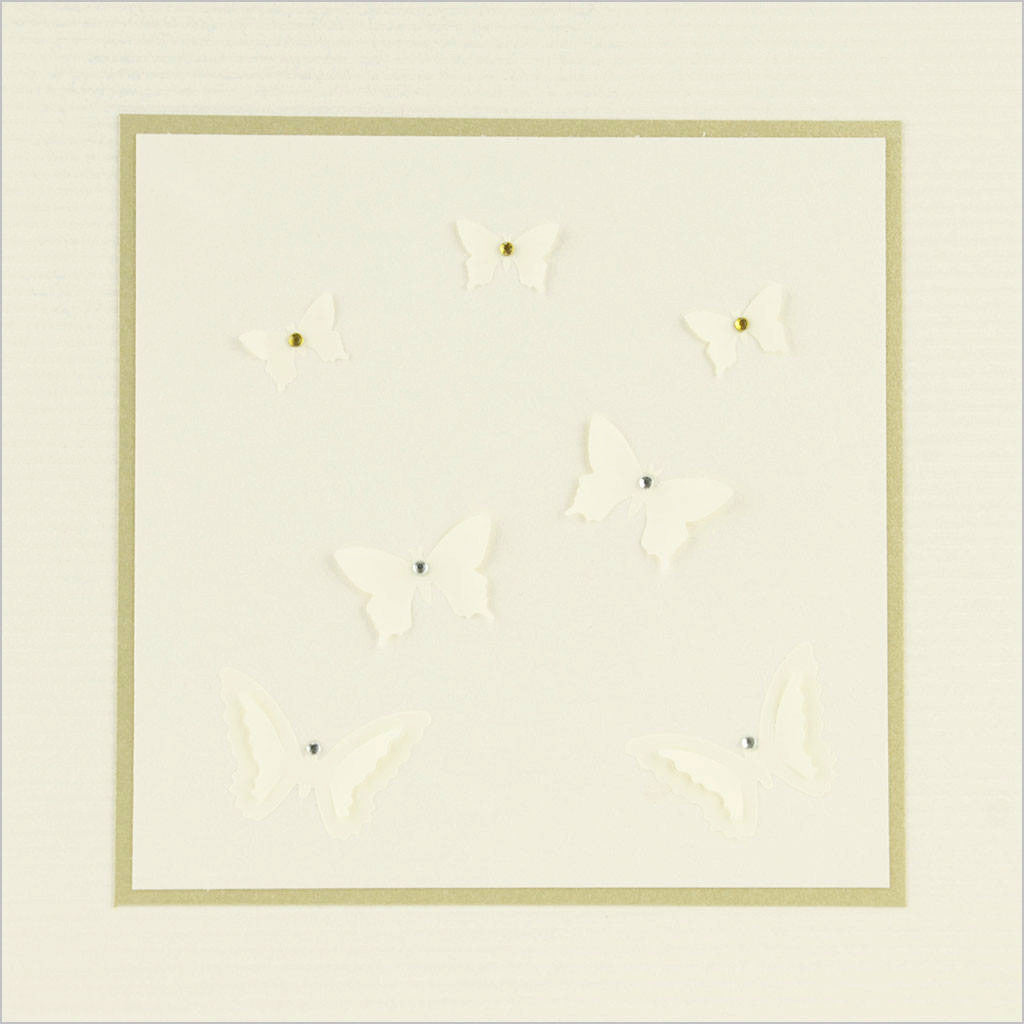 and-made greeting card featuring small and large 3-D butterflies with small diamante detailing