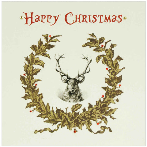 Vintage Christmas card featuring a stag surrounded by a Christmas wreath with metal studs and red diamanté detailing